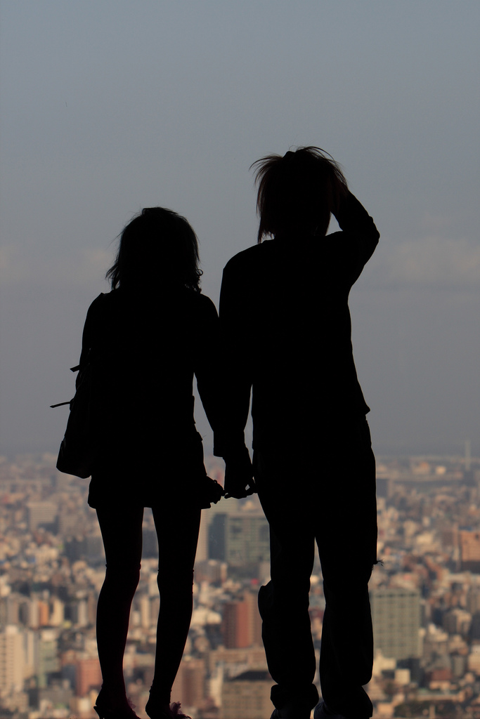 Couple looking over city