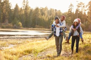 happy family walking in nature having fun for free