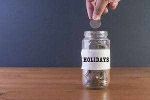 savings jar labeled "holidays"